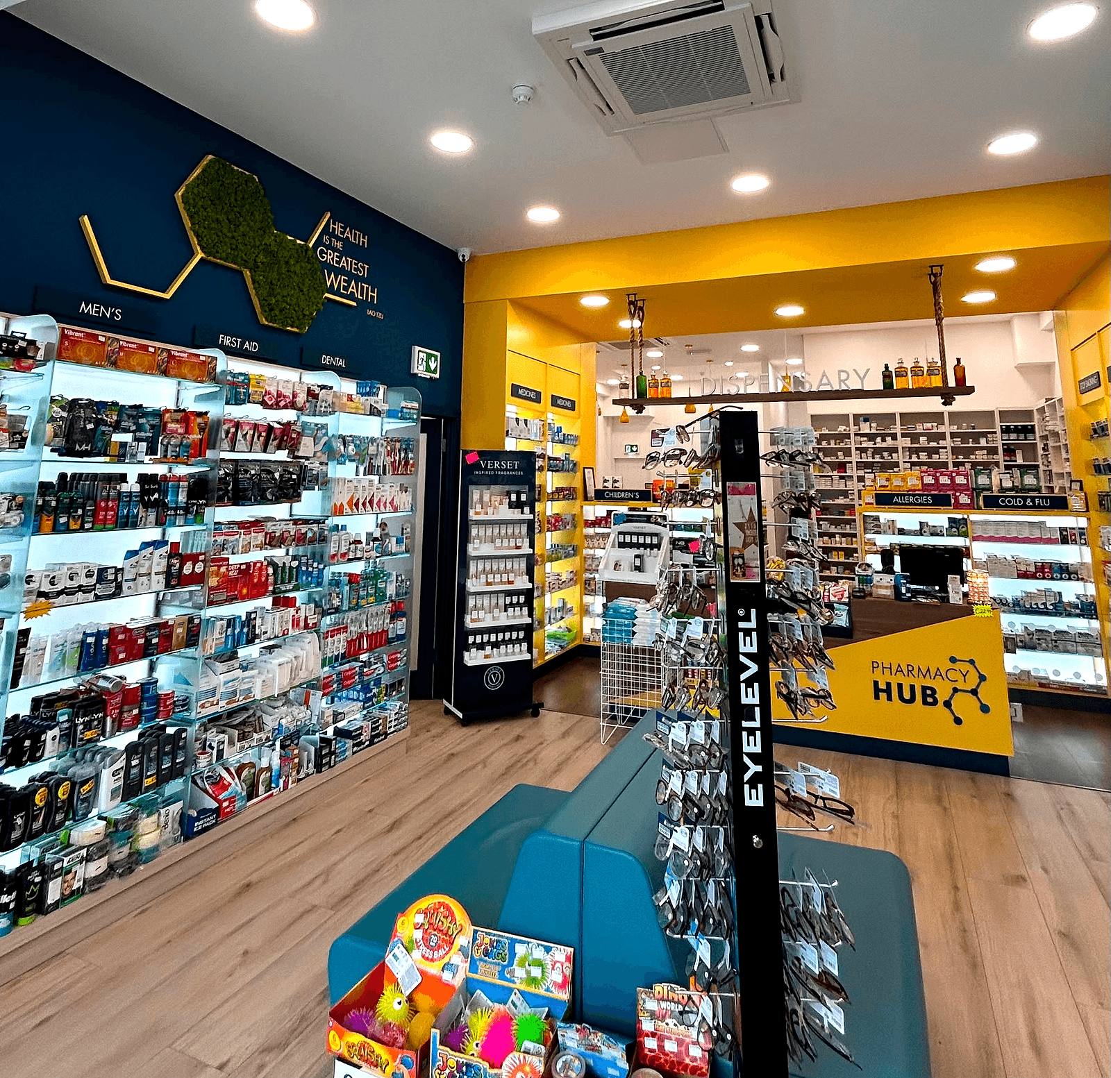 Night-time storefront at Pharmacy Hub, Tallaght